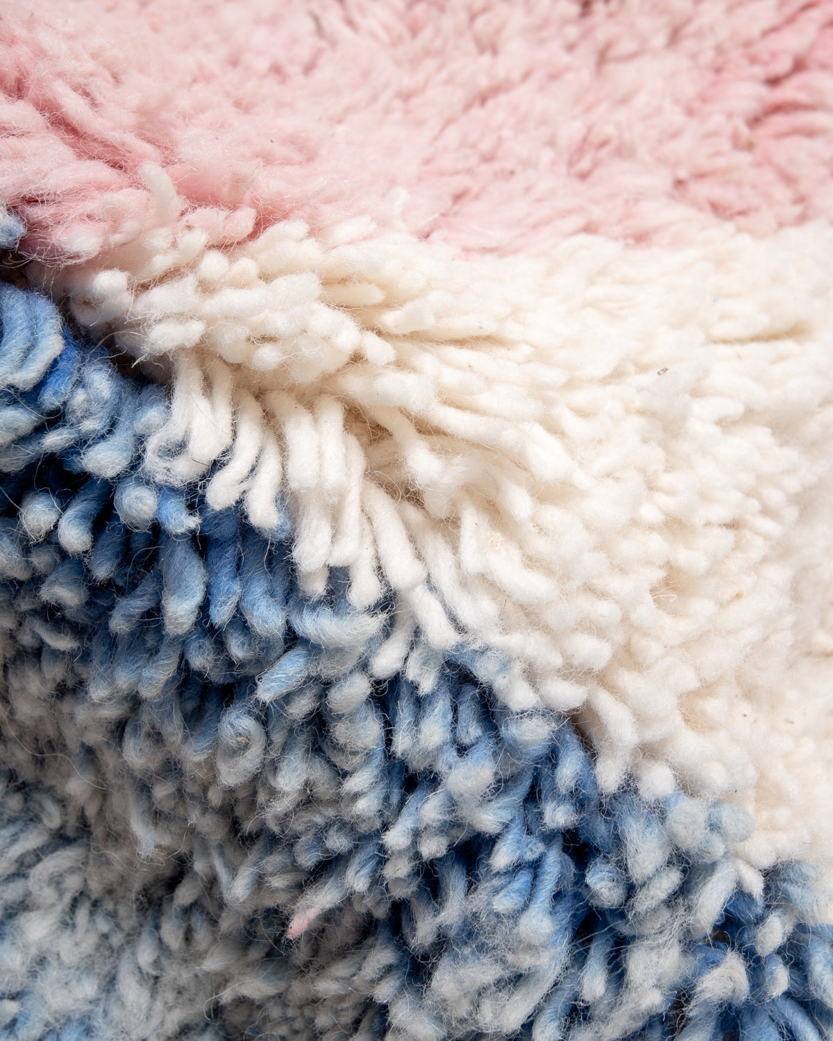 Modern, designer, handcrafted Berber rug from Morocco. Beniourain carpet with beautiful colours and patterns and fluffy wool texture.
